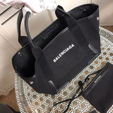 Styled lifestyle shot of elevated statement women's handbag – women's luxury handbag