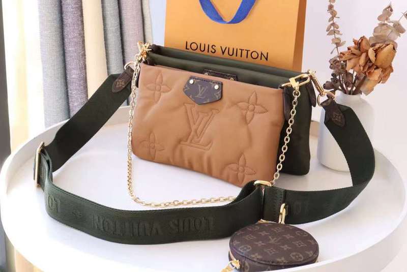 Side profile of classic sleek women's handbag – women's statement bag