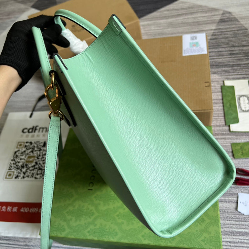 Front view of statement polished women's handbag – women's statement bag