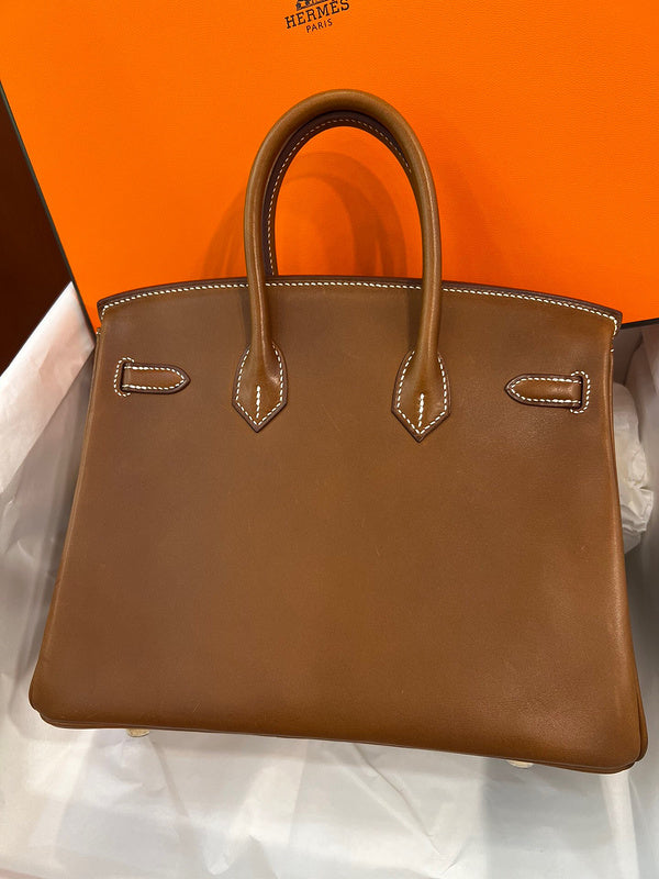 Side view of elegant structured handbag
