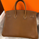 Side view of elegant structured handbag
