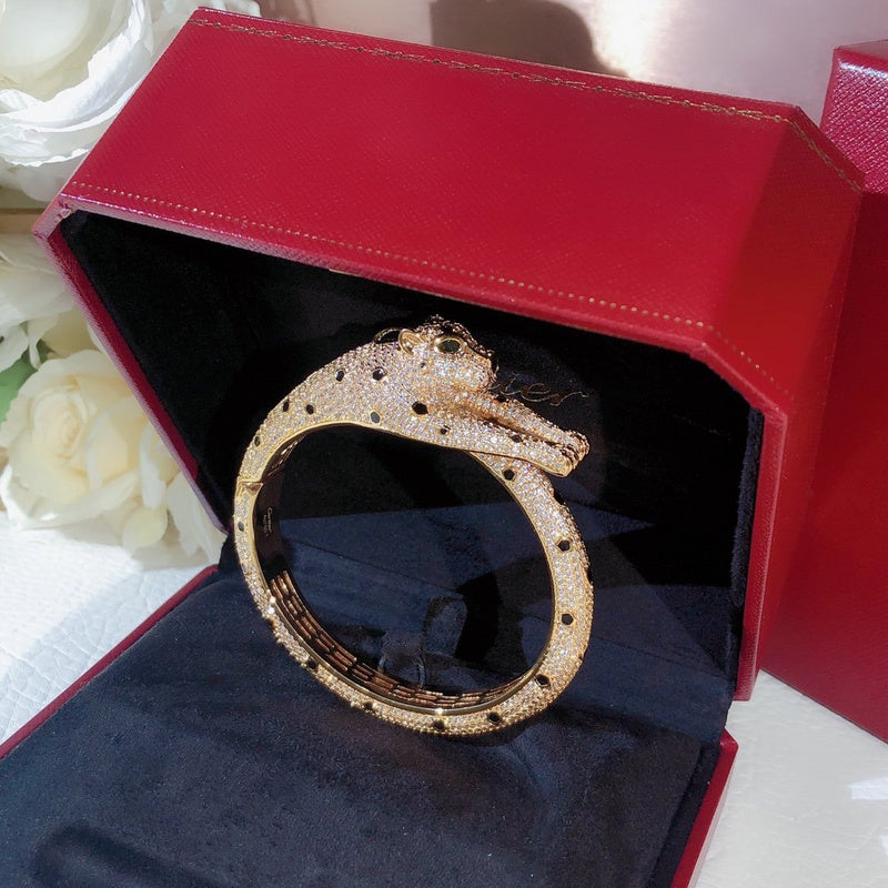 Side view of Cartier unisex jewelry piece