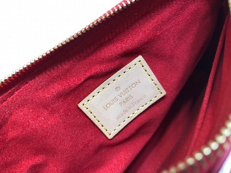 Front view of polished elevated women's handbag – women's designer-style accessory