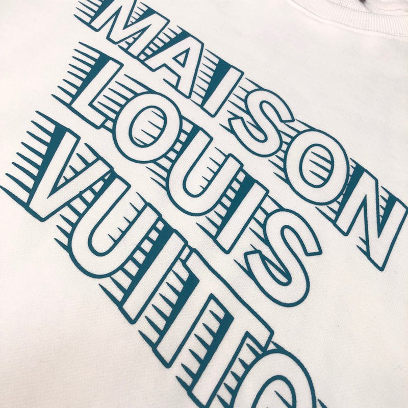 Full styled look of Louis Vuitton luxury clothing with signature branding