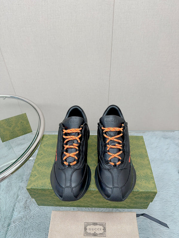 Gucci all-black luxury sneakers view 6 heritage-inspired look