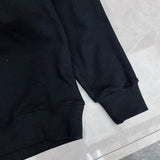 Flat lay presentation of Gucci luxury clothing with monogram-inspired silhouette
