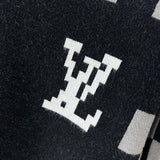 Flat lay presentation of Louis Vuitton luxury clothing with logo-detail design
