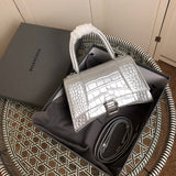 Side profile of premium signature women's handbag – women's statement bag