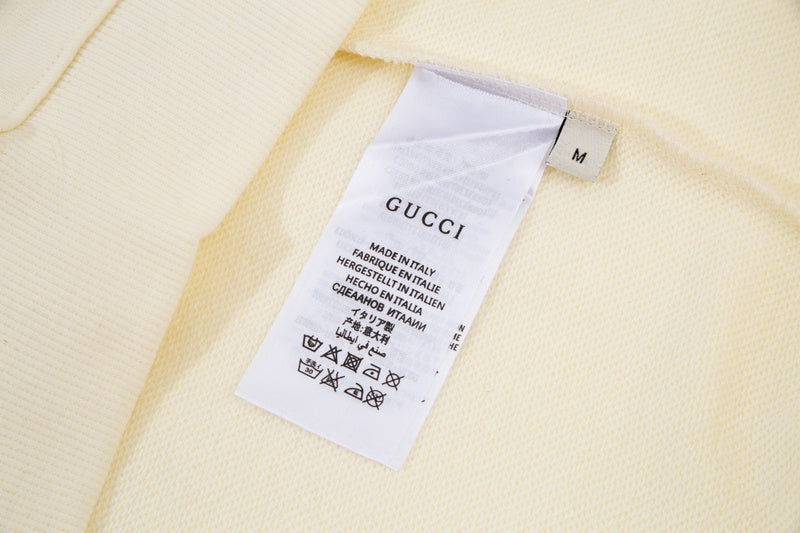 Close-up detail shot of Gucci luxury clothing with contemporary cut
