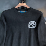 Full styled look of Louis Vuitton luxury clothing with monogram-inspired silhouette