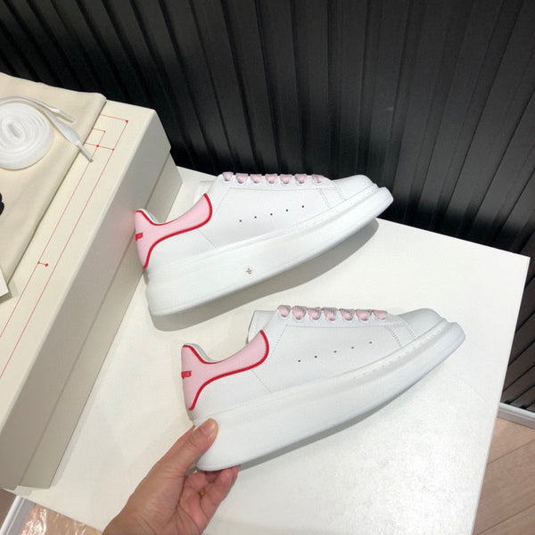 Alexander McQueen Designer sneakers in crisp white everyday casual design front view