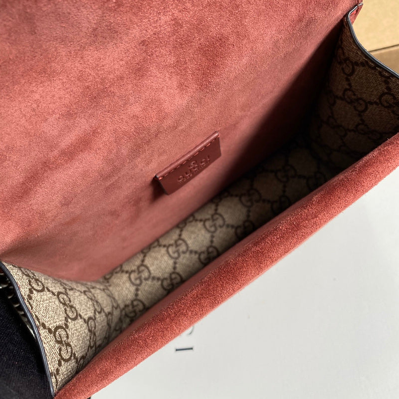 Side profile of signature polished women's handbag – women's statement bag