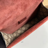 Side profile of signature polished women's handbag – women's statement bag