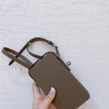  signature satchel styled with outfit 30