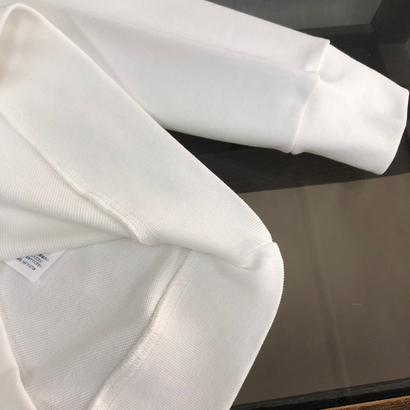 Back view of Louis Vuitton luxury clothing with signature branding