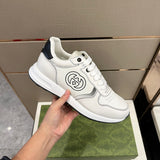 Gucci Designer sneakers in bold contrast minimalist modern build front view