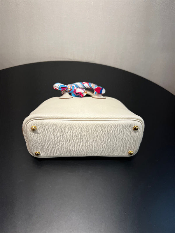  tailored top-handle bag detail view showing craftsmanship