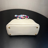  tailored top-handle bag detail view showing craftsmanship
