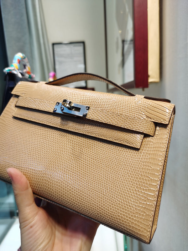 Side view of poised structured handbag