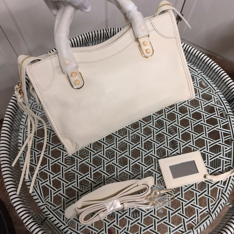 Top view of modern statement women's handbag – women's luxury accessory