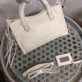 Top view of modern statement women's handbag – women's luxury accessory