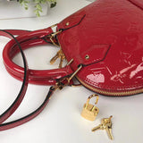 Styled lifestyle shot of refined statement women's handbag – women's luxury handbag