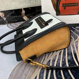 Styled lifestyle shot of refined polished women's handbag – women's statement bag