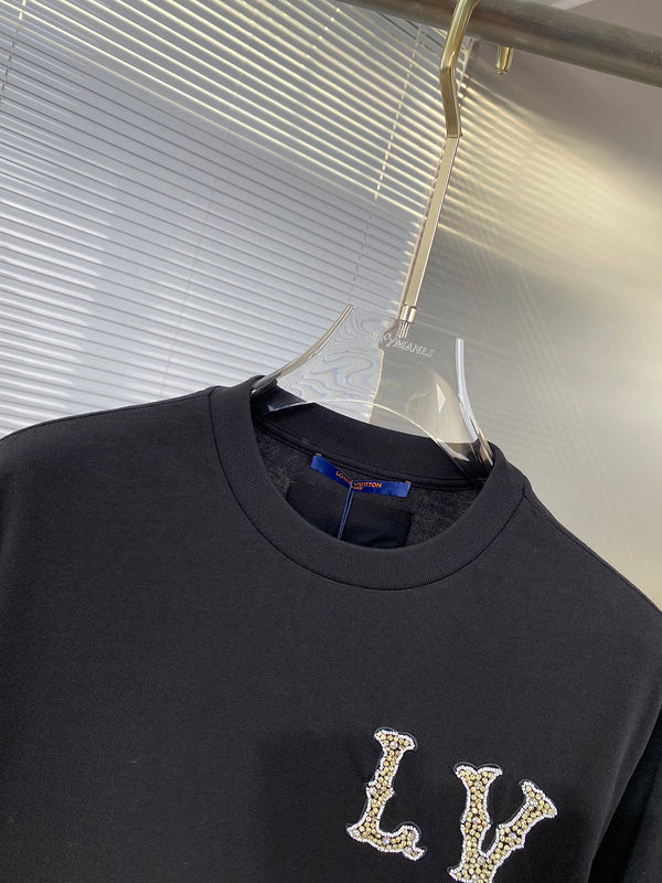 Close-up detail shot of Louis Vuitton cotton t-shirt with streetwear-inspired cut