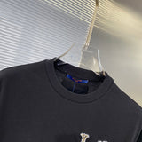 Close-up detail shot of Louis Vuitton cotton t-shirt with streetwear-inspired cut