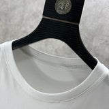 Close-up detail shot of Givenchy luxury clothing with everyday silhouette