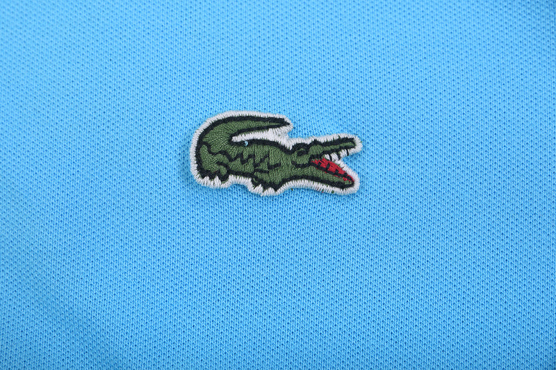 Back view of Lacoste luxury clothing with tailored silhouette