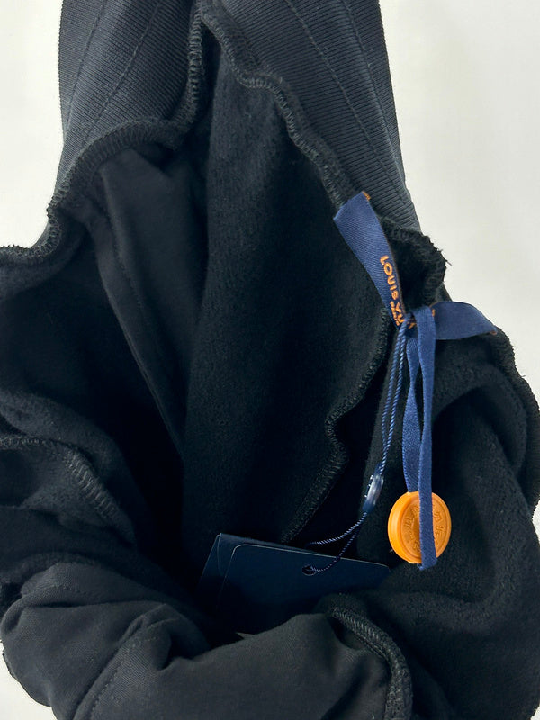 Close-up detail shot of Louis Vuitton luxury clothing with contemporary cut
