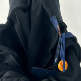 Close-up detail shot of Louis Vuitton luxury clothing with contemporary cut