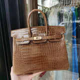 Side view of tailored structured handbag