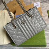 Handle and strap detail of classic modern women's handbag – women's statement bag