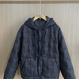 Front view of Louis Vuitton luxury clothing with contemporary cut