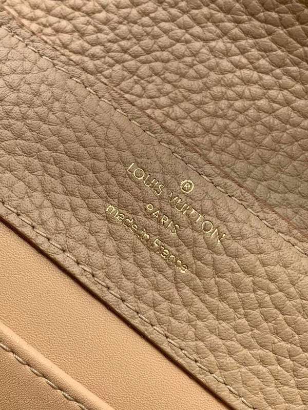 Side profile of signature modern women's handbag – women's luxury handbag