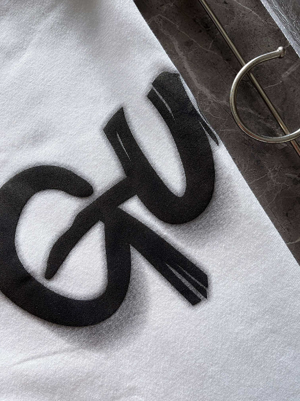 Back view of Gucci luxury clothing with monogram-inspired silhouette