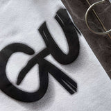 Back view of Gucci luxury clothing with monogram-inspired silhouette