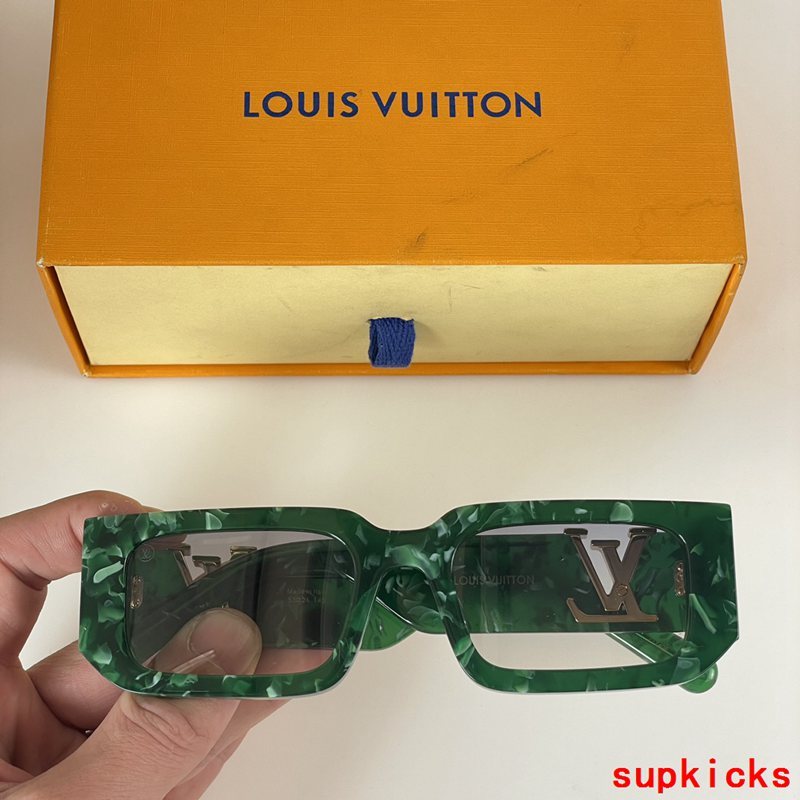 Close-up detail view of Louis Vuitton unisex sunglasses