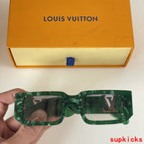 Close-up detail view of Louis Vuitton unisex sunglasses
