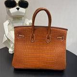  Timeless top-handle bag carried on shoulder