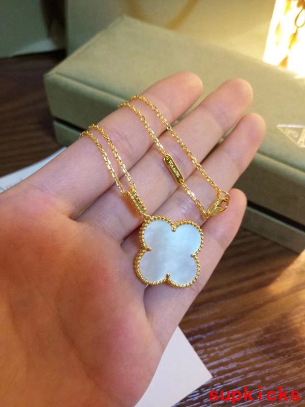 Close-up detail view of Van Cleef & Arpels unisex jewelry piece