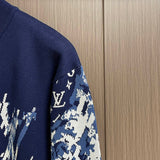 Full styled look of Louis Vuitton luxury clothing with monogram-inspired silhouette