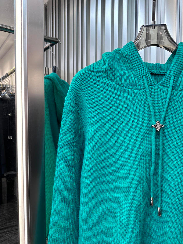 Close-up detail shot of Louis Vuitton luxury clothing with everyday silhouette