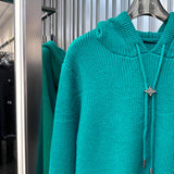 Close-up detail shot of Louis Vuitton luxury clothing with everyday silhouette