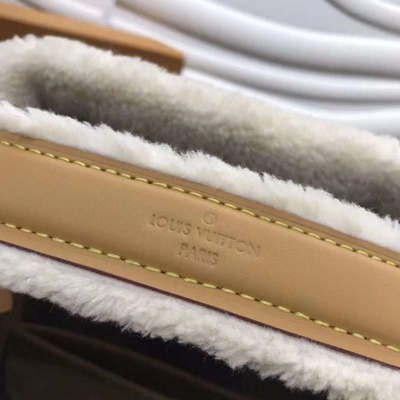 Front view of modern signature women's handbag – women's luxury accessory