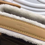 Front view of modern signature women's handbag – women's luxury accessory
