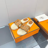 Hermès White Ankle Strap Sandals - Angled View