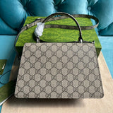 Front view of elevated classic women's handbag – women's designer-style accessory